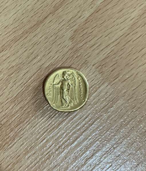 Золотая монета статер