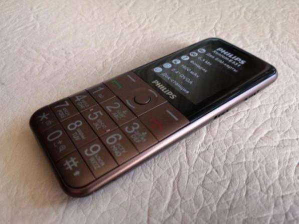 Новый Philips Xenium E331 Brown (полный комплект) в Москве фото 3