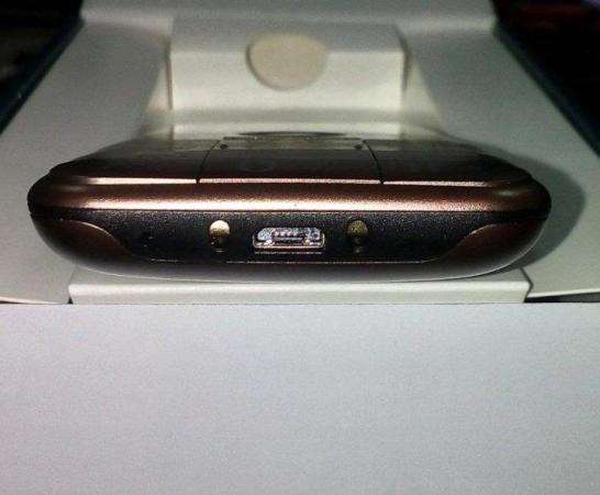 Новый Philips Xenium E331 Brown (полный комплект) в Москве фото 5