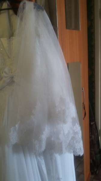 Шуба мутоновая, свадебное платье в Перми фото 9
