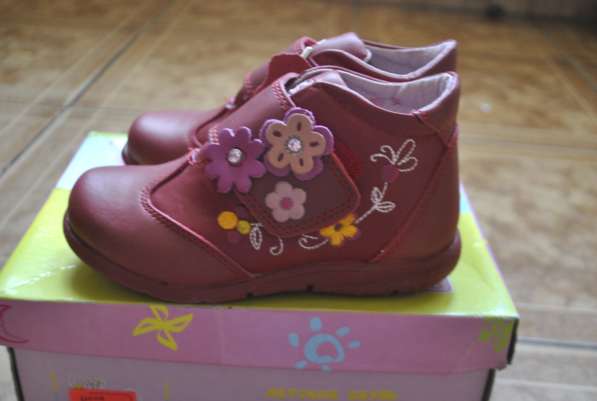 Новые кожаные ботинки