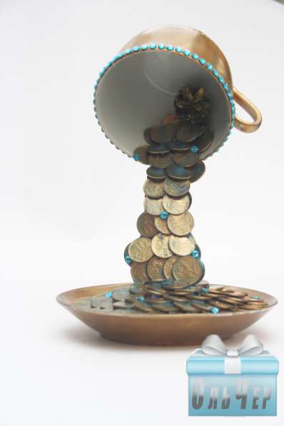 Парящая чашка с льющимися монетами в Ростове-на-Дону