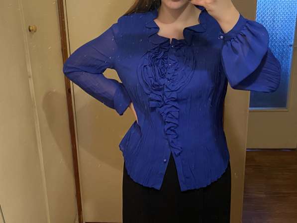 Элегантная блузка с воланами. Imperia fashion