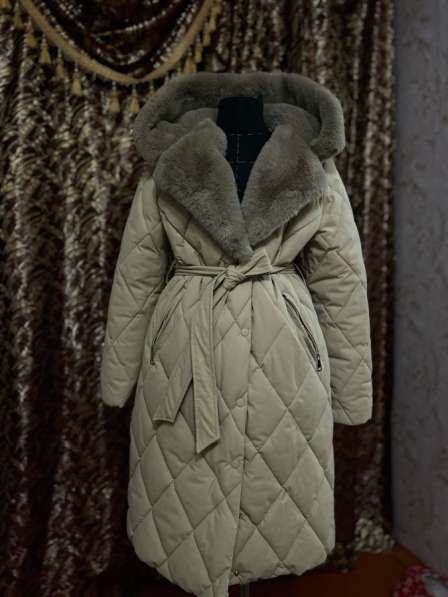 Продам пуховик