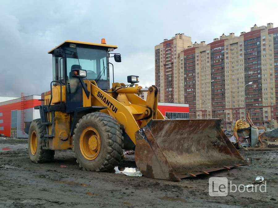 Водитель фронтального погрузчика спб. Погрузчик Shantui sl30w. Погрузчик sl30 фронтальный. Шантуй сл 30 w. Фронтальный погрузчик Shantui.